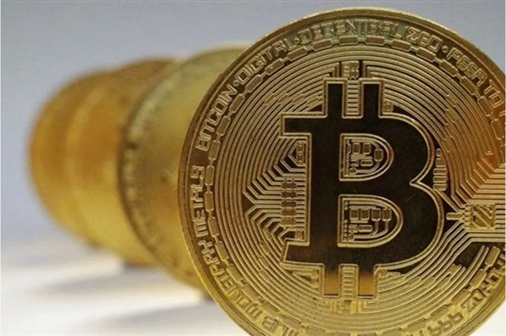 صورة مرافقة للخبر: بيتكوين تهبط دون 80 ألف دولار وسط اضطرابات الأسواق