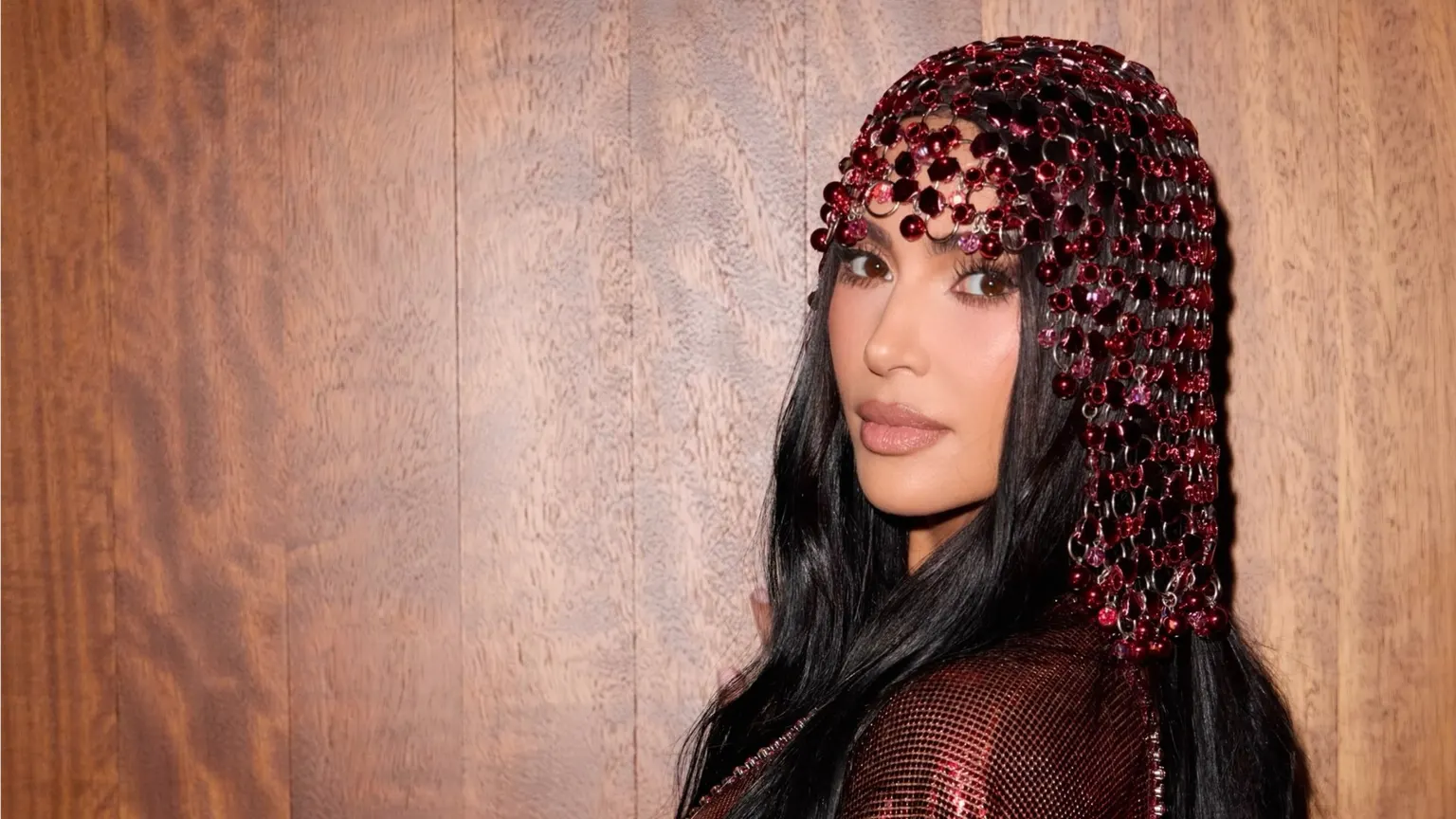Image accompanying: Kim Kardashian braless birthday looks spark online debate as Kendall Jenner is absent