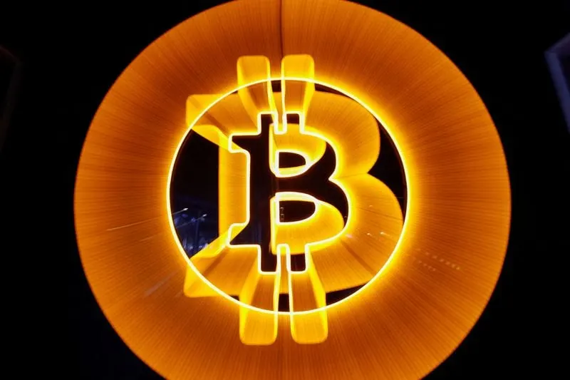 Image accompanying: Bitcoin trades above $82,000 as rising oil prices, Fed outlook weigh