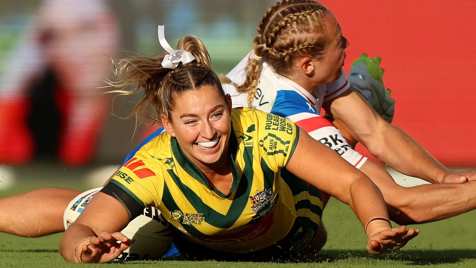 Image accompanying: England suffer 15-try defeat against rampant Australia